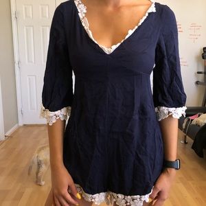 Blue romper with white flower frills, good cond